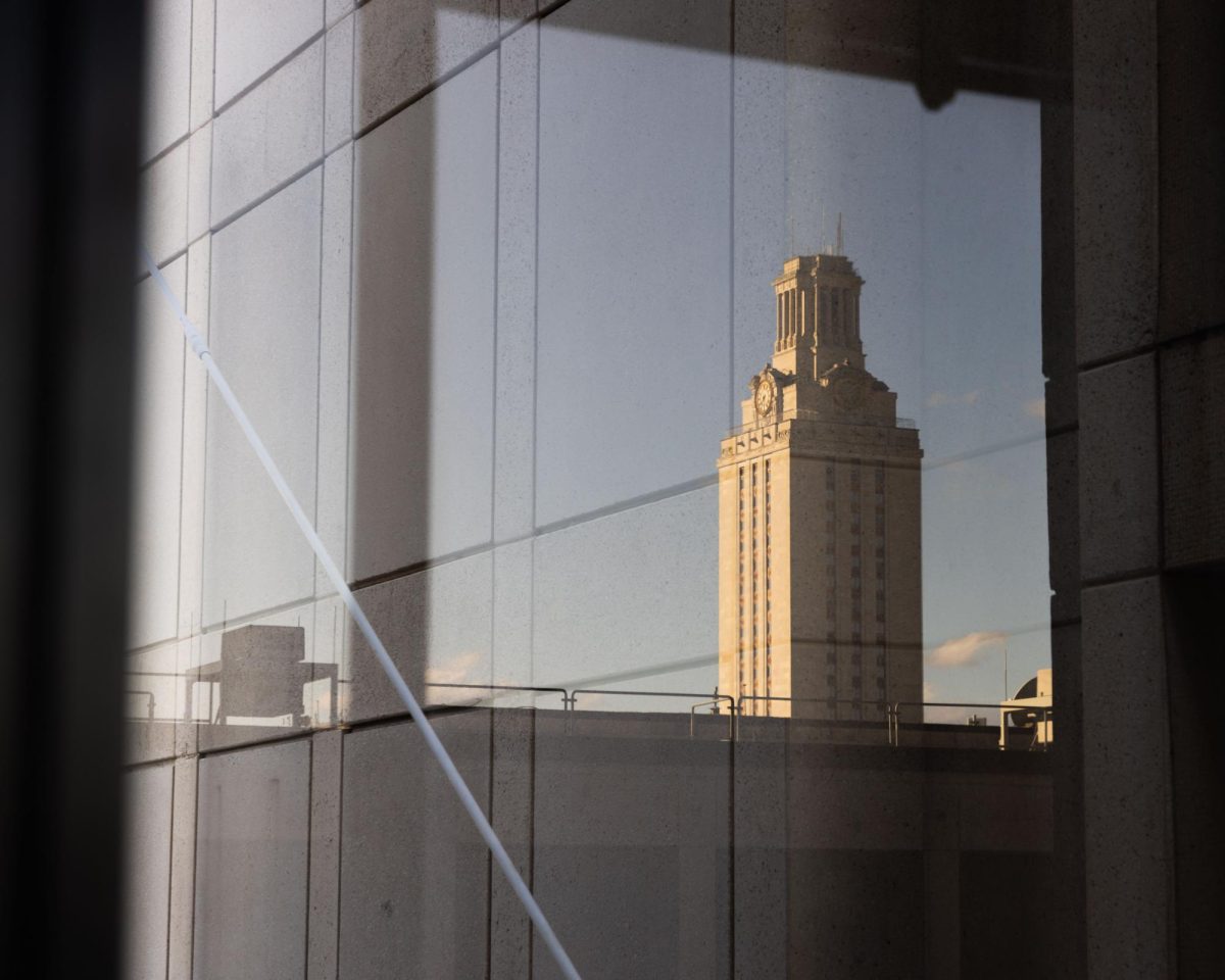 The UT Tower, seen from the reflection in a window in the CMB, on Feb. 3, 2025.