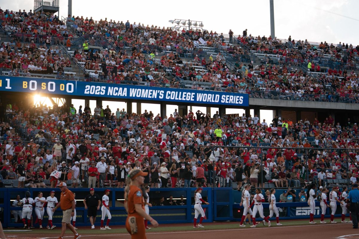 Junior Ashton Maloney stands on the field before getting ready to play defense during the second game of the Women's College World Series Championship against Texas Tech on June 5, 2025. 